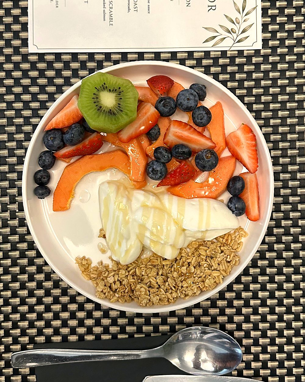 Fresh fruit, yoghurt, honey and granola breakfast at Oak Manor guest house in Newlands