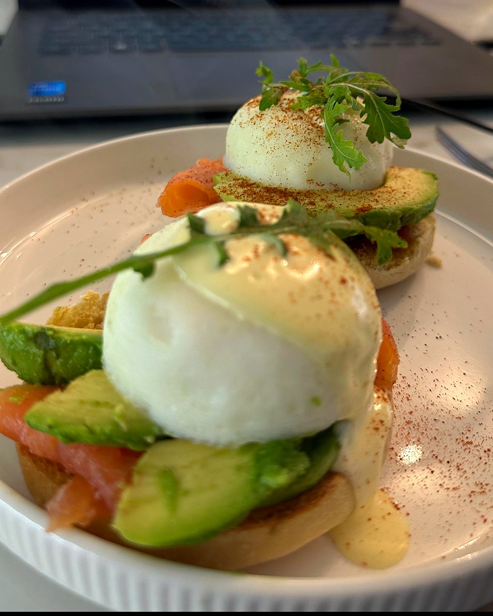 Eggs Benedict with smoked salmon, avocado and hollandaise, made to order at Oak Manor guest house in Newlands