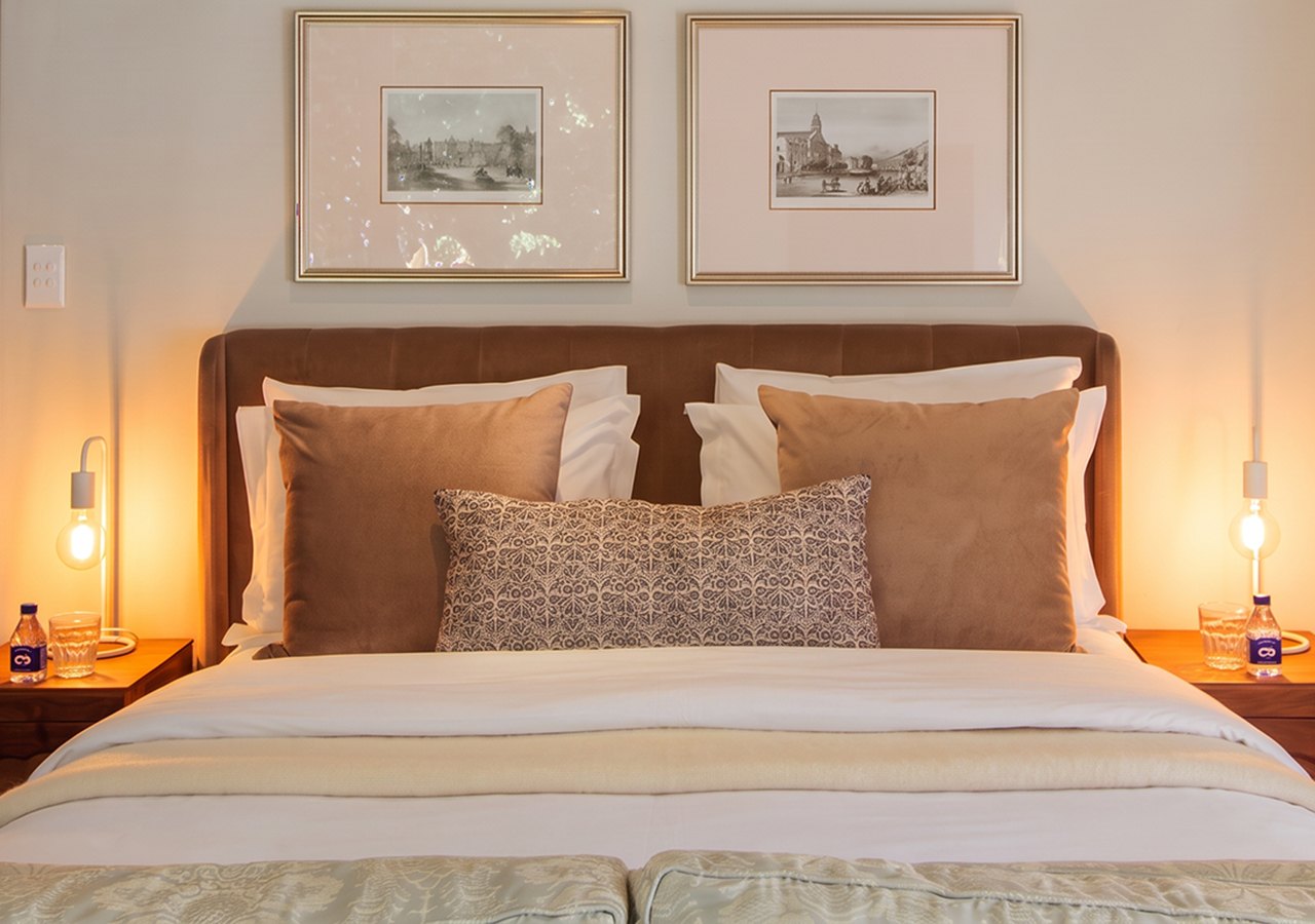 The Boudoir, Queen bed with velvet headboard, at Oak Manor boutique guest house in Newlands, Cape Town